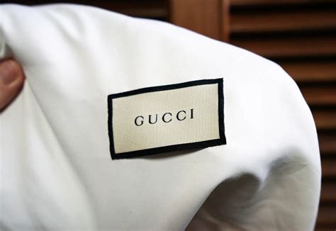 fake gucci symbol|authentic gucci clothing tags.